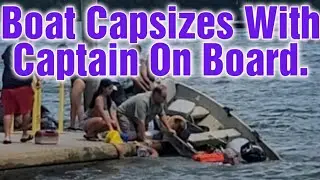 Small Boat Capsizes At Boat Ramp With Captain On Board.