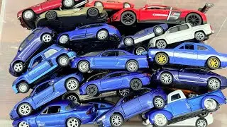 Various Blue Diecast Model Cars From The Box