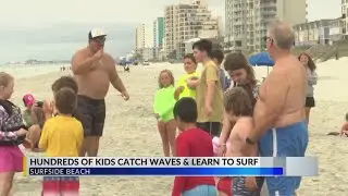 Surf Dreams Foundation celebrates Take-A-Kid Surfing Day in Surfside Beach