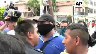 State official taken hostage by crowd after protracted confrontation during violent protests