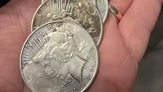 Stacking Silver Peace Dollars over Morgan Silver Dollars