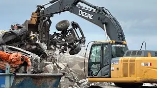 210G John Deere scrap pile prep and beginning of load. #johndeere #scrap #peterbilt