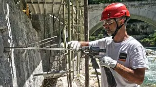 Stabilizzazione Manufatti Controterra con Tiranti di Ancoraggio su Muro Arginale a Rovereto - URETEK