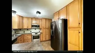 Wallace Real Estate - 11032 Hughlan Drive