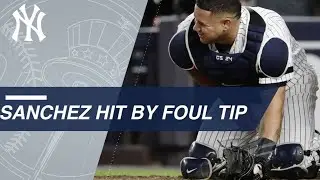 AL WC: Sanchez hit hard on foul tip, stays in game