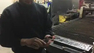 Deburring plasma cut plates