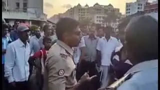 TRAFFIC POLICE BEAT YOUTH IN PUBLIC SEE AND JUDGE WHO IS RIGHT OR WRONG