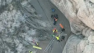Moment hiker rescued from quicksand after activating SOS signal