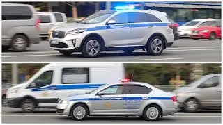 Police cruisers responding with siren