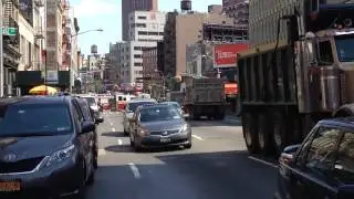 FDNY ENGINE 55 RESPONDING ON LAFAYETTE STREET IN THE CHINATOWN AREA OF MANHATTAN IN NEW YORK CITY.