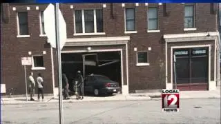 Car slams into new arcade bar