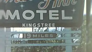 Vintage Footage of a Roadside Motel Sign
