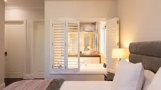 STOP MOTION PVC PLANTATION SHUTTERS