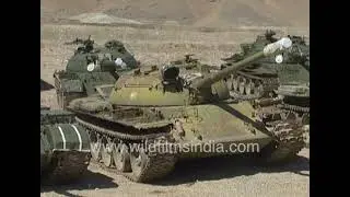 Archival Afghan Soldiers working on old soviet era Tanks