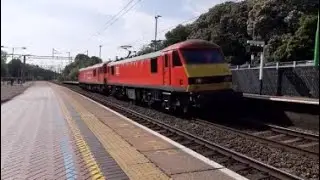 DB Cargo UK 90035 passes through Berkhamsted with 92015 In tow 24/05/23