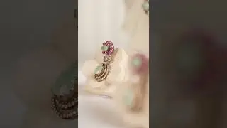 Victorian charm reimagined with vibrant Russian emeralds.