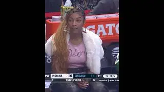 Angel Reese on the sideline with injury