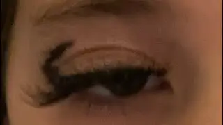 Learning how to apply false lashes