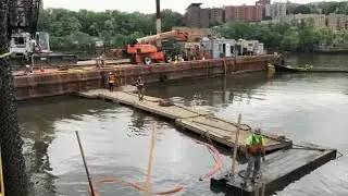 JFK's WWII era patrol boat is raised from Harlem River