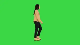 Indian Girl Walking and Smiling on a Green Screen I 2024