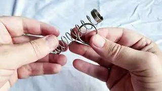 Solving Tesla&rsquo;s Coil! A Metal Disentanglement Puzzle by Professor Puzzle
