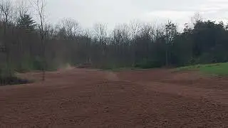 Case VAC rolling a field after planting grass seed.