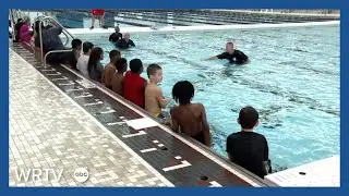 First-of-its-kind program gives free swim lessons to Lawrence students in school