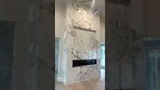 Luxury large-format porcelain fireplace and wall