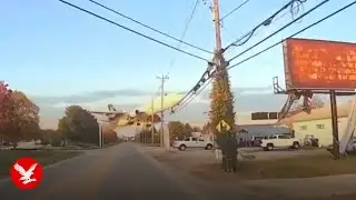 Tire shop workers run for their lives as plane explodes above them