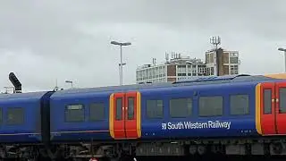 450108/450088/450112 Arriving Clapham Junction.