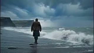 Scotsman Walking Wearing Kilt On Sands of Wright Beach On Winter History Visit To Orkney Scotland