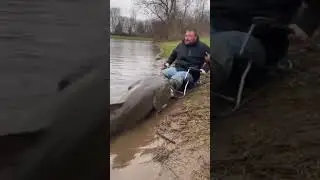 Giant Catfish Traps Fisherman&rsquo;s Legs and Drags Him Into Mud