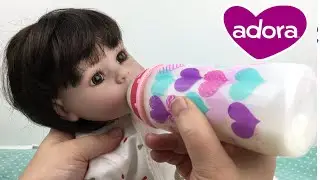 Feeding Adora Baby Doll a Bottle