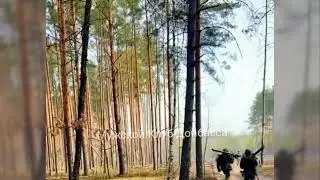 Ukraine - Ukrainian ground forces in a forested area near the front line. War footage