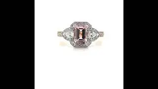 Stunning Morganite and Diamond Ring set into a 18K Rose Gold band.