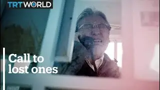 Tsunami survivors call lost loves on the phone of the wind