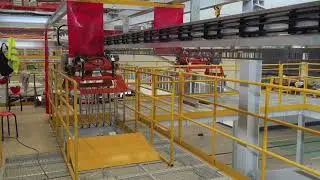 High-speed electrified monorail system for fast and careful tire transport