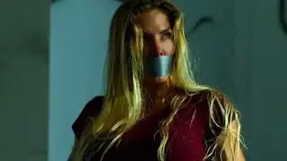 Kelly Greyson tape gagged (Fortress: Sniper's Eye 2022 movie)