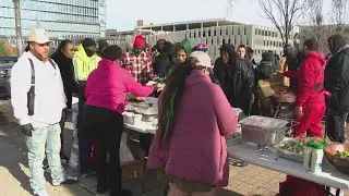 Food giveaway held in downtown Indianapolis on Christmas Eve