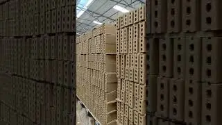 Behind the Scenes: Loading Terracotta Tiles and Bricks into a Kiln Car
