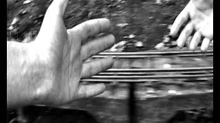 Music video for Drop by Burning Shapes, British indie rock band, egg and spoon race