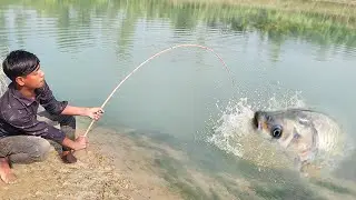 Fishing Video || Traditional village boy fishing in pond with hook in heavy rain || Hook fishing