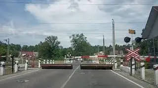 Railroad crossing. Double-deck train. Russian Railways. How does automatics railway crossing.