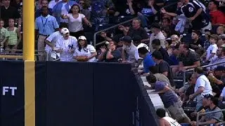 Fan is hit by Johnson's ground-rule double