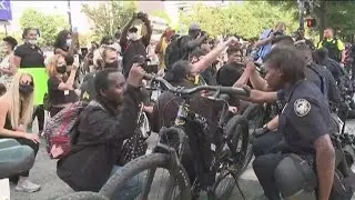 Protesters tell others to keep the peace