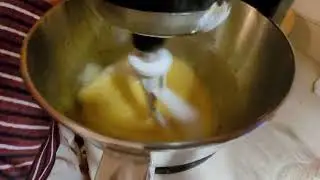 Making traditional Italian pizzelles. Anise snowflake cookies.