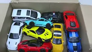 Box Full of Model Cars – Corvette Stingray, Lotus Evija, BMW M4, Audi R8, Lamborghini Revuelto