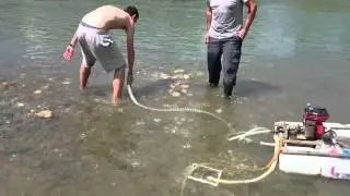 Gold dredging in river Drava