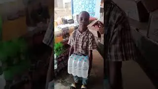 this boy recite Quran, so to ease the load he carry. genius boy