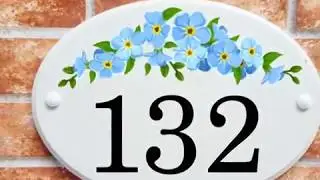 Ceramic style house signs for house names and house numbers